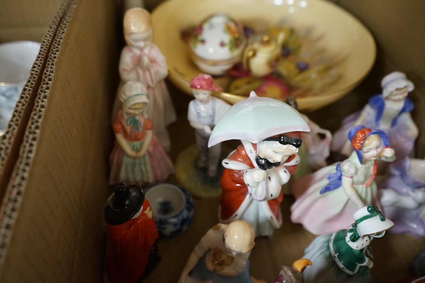 A collection of mixed ceramics to include Doulton figures, set of six Royal Albert old country roses cups and Spode plates